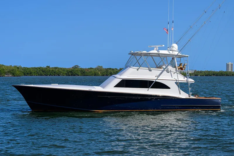Slide: The Image of 2006 Blackwell Custom Carolina yacht on calm water with clear blue sky. - 3