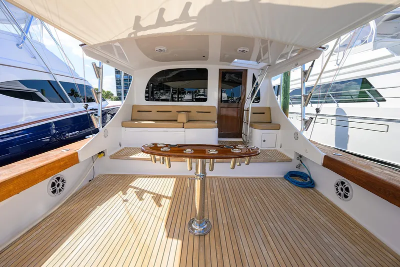 Slide: The Image of Spacious deck of 2006 Blackwell Custom Carolina yacht with seating and fishing rod holders. - 7