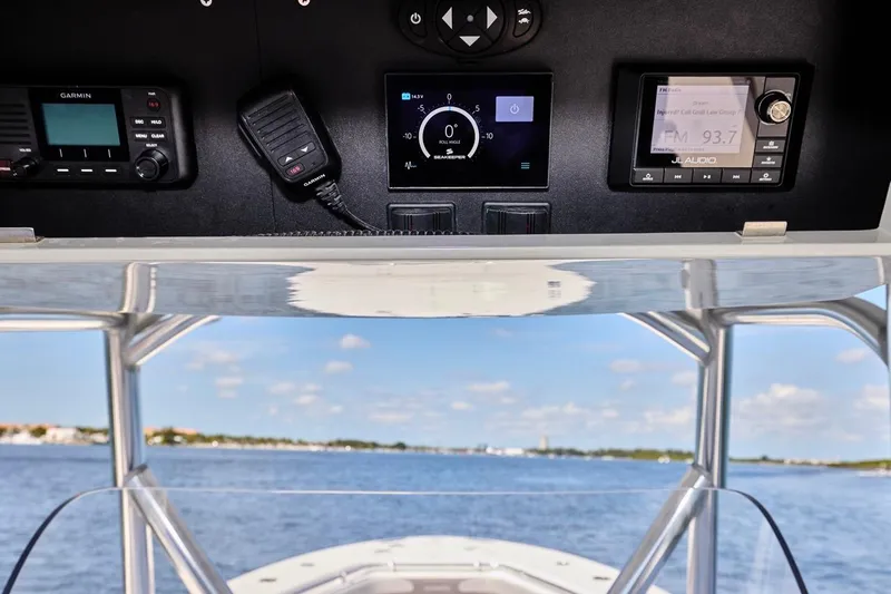 Slide: The Image of Control panel of a 2022 Bluewater 35 boat with ocean view. - 29