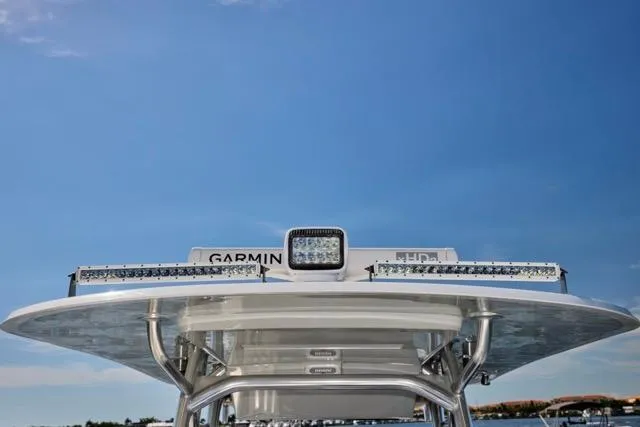 Slide: The Image of Bluewater 35 boat roof with Garmin equipment, 2022 model, under clear blue sky. - 37