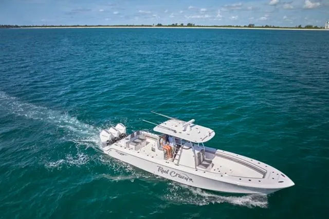 Slide: The Image of 2022 Bluewater 35 boat cruising on open ocean waters. - 45