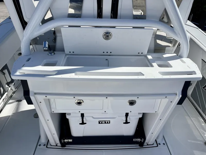Slide: The Image of 2023 Blackfin 272 boat interior with sink and Yeti cooler. - 13