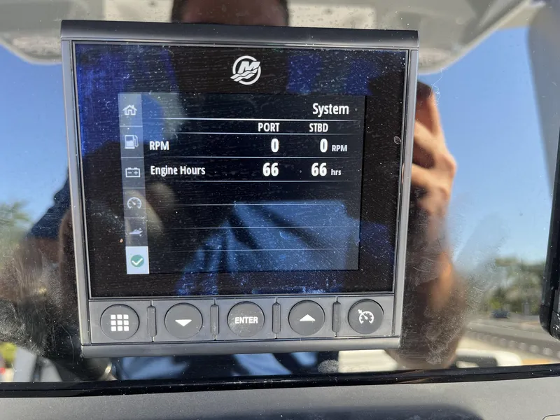 Slide: The Image of Display screen on 2023 Blackfin 272 boat showing engine hours and RPM. - 16
