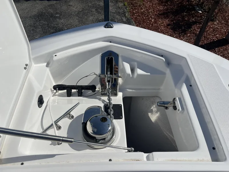 Slide: The Image of Anchor compartment of 2023 Blackfin 272 boat with winch and chain. - 19
