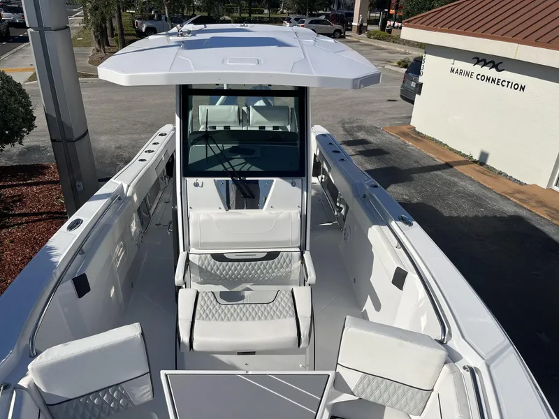 Slide: The Image of 2023 Blackfin 272 boat with sleek design and spacious seating at Marine Connection. - 23