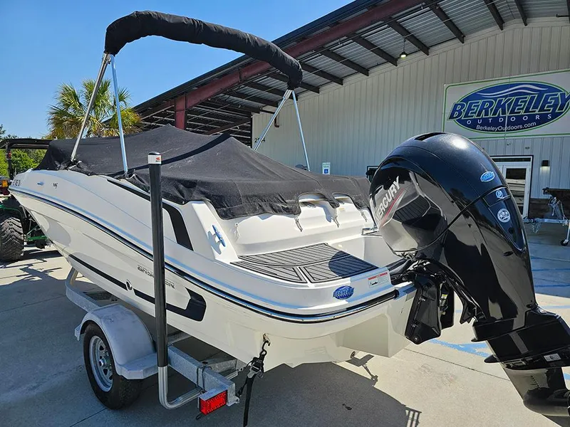 Slide: The Image of 2021 Bayliner VR5 Bowrider OB with outboard motor, parked at Berkeley Outdoors. - 11