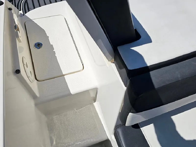 Slide: The Image of 2021 Bayliner VR5 Bowrider OB interior seating and storage compartment detail. - 13