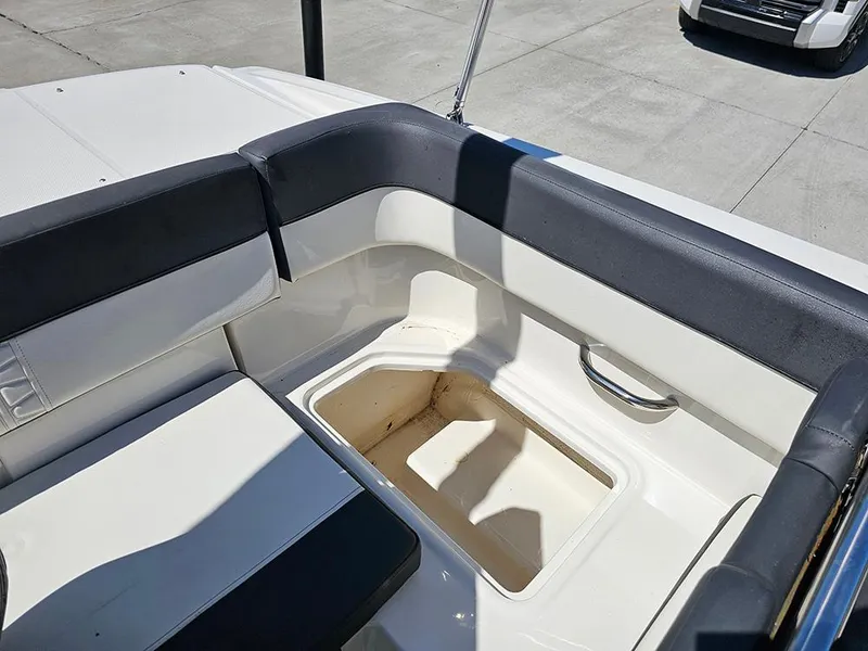 Slide: The Image of 2021 Bayliner VR5 Bowrider OB interior seating with storage compartment. - 16