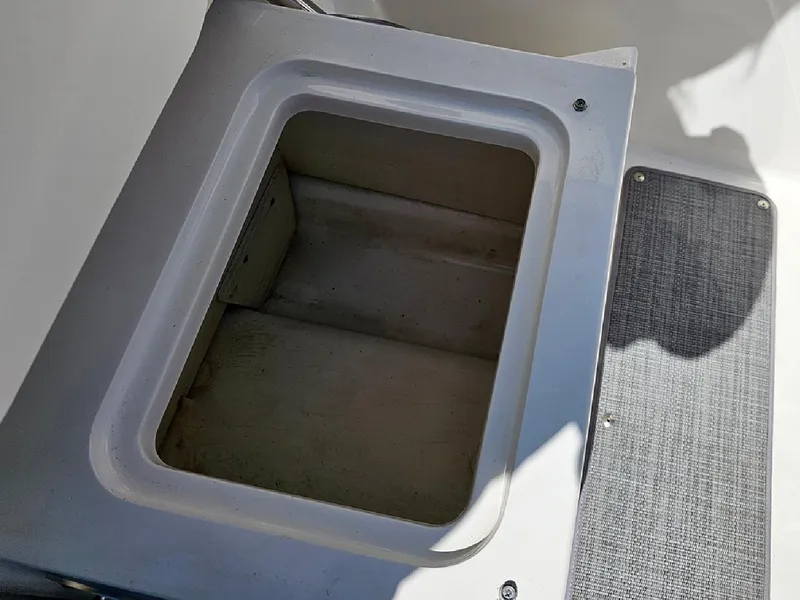 Slide: The Image of Storage compartment on a 2021 Bayliner VR5 Bowrider OB boat. - 19