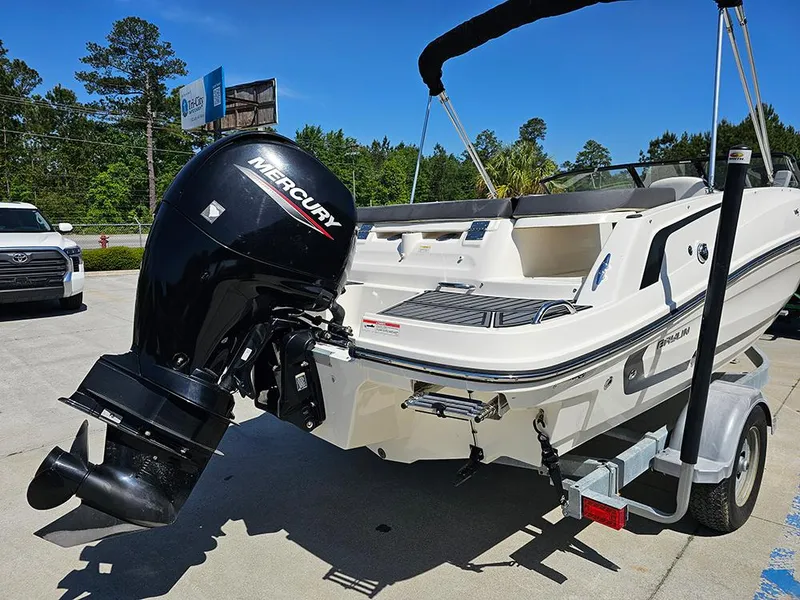 Slide: The Image of 2021 Bayliner VR5 Bowrider OB with Mercury outboard engine on a trailer. - 7