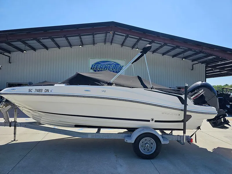 Slide: The Image of 2021 Bayliner VR5 Bowrider OB on trailer outside Berkeley building. - 9