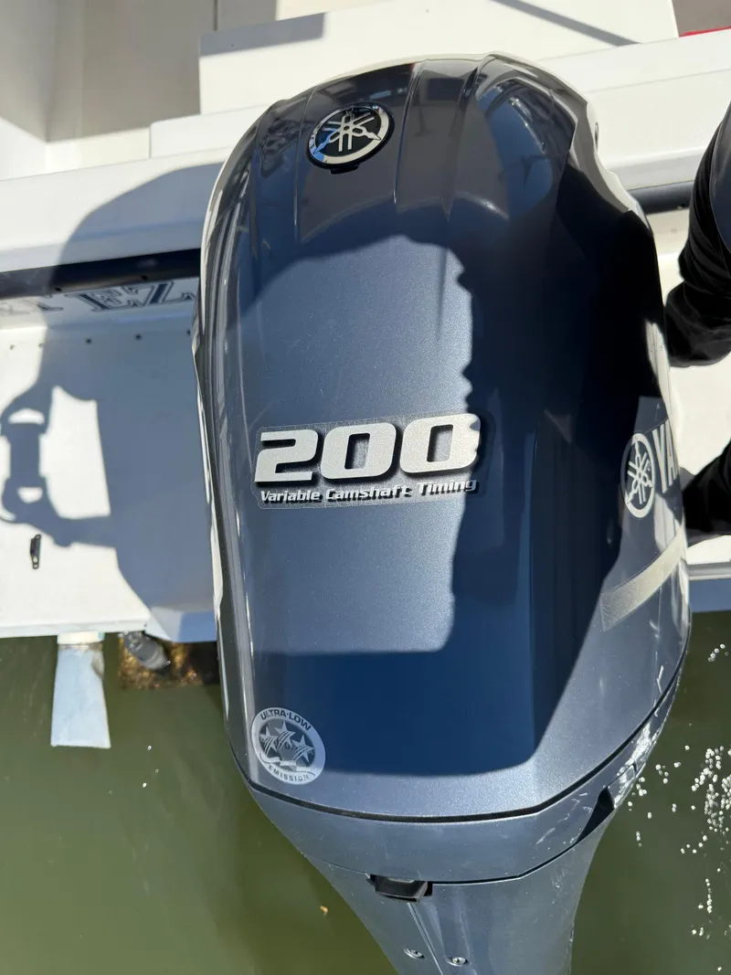 Slide: The Image of Yamaha 200 horsepower outboard motor on 2018 Rosborough 246 Yarmouth boat. - 17