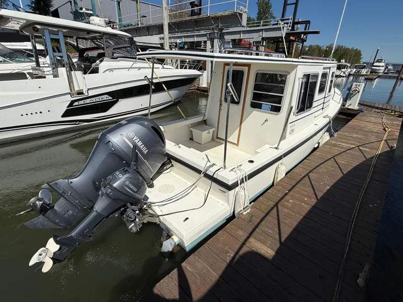 Slide: The Image of 2018 Rosborough 246 Yarmouth boat docked with Yamaha outboard motor. - 3