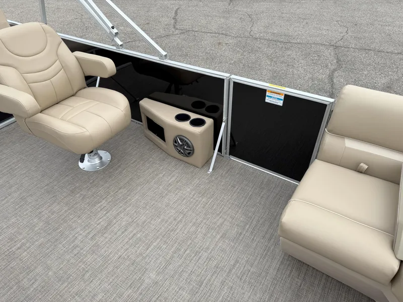 Slide: The Image of Luxurious seating on 2025 Godfrey EX2086SFLX boat with beige upholstery and cup holders. - 14