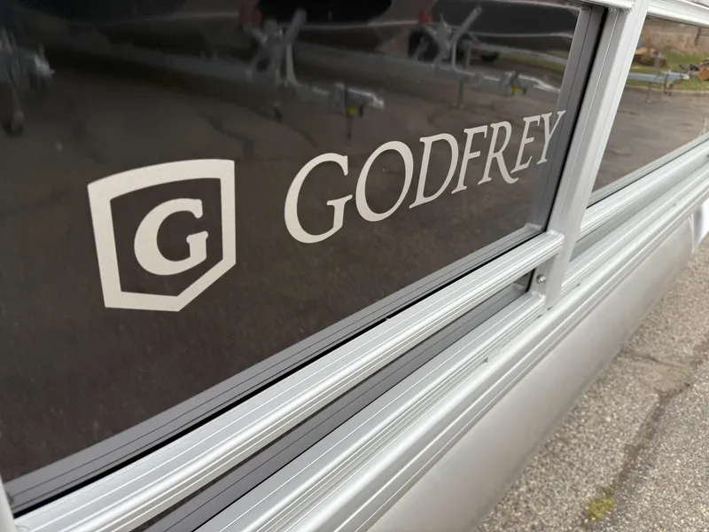 Slide: The Image of 2025 Godfrey EX2086SFLX logo on sleek metallic surface. - 17