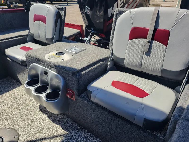 Slide: The Image of 2016 Tracker Pro Guide V-175 Combo boat seats with cup holders and storage. - 12