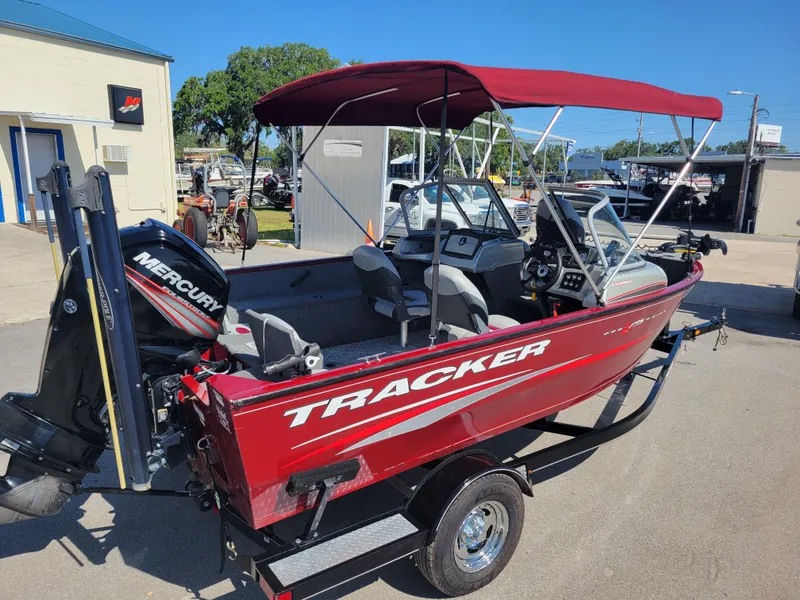 Slide: The Image of 2016 Tracker Pro Guide V-175 Combo boat with red canopy and Mercury outboard motor. - 5