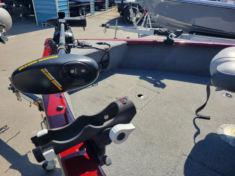 Slide: The Image of 2016 Tracker Pro Guide V-175 Combo boat interior with fishing rod holder and trolling motor. - 8