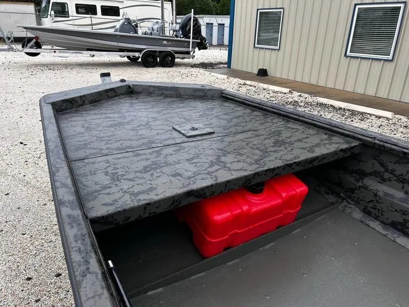 Slide: The Image of 2025 Gator Tail 1860 Extreme Mod V boat with red fuel tank on deck. - 11