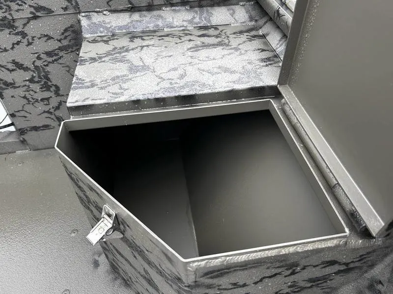 Slide: The Image of Open storage compartment in 2025 Gator Tail 1860 Extreme Mod V boat. - 9
