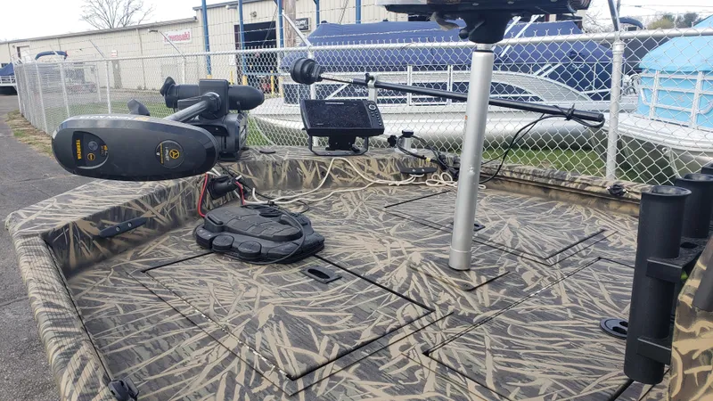 Slide: The Image of Camouflage-patterned Lowe RTX1760PT boat deck with fishing equipment, 2021 model. - 6