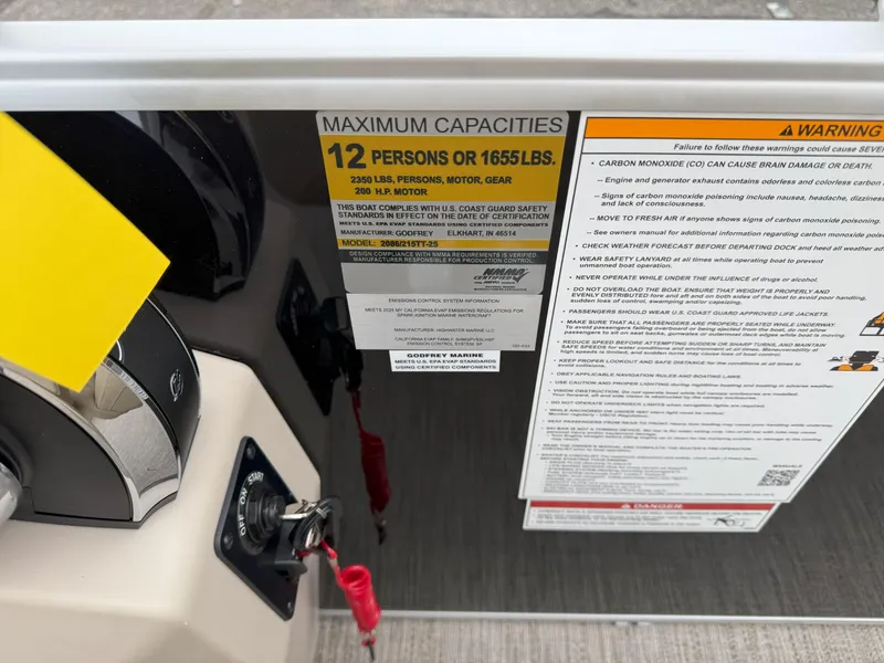Slide: The Image of Godfrey EX2086CX 2025 boat capacity label, maximum 12 persons or 1655 lbs. - 15