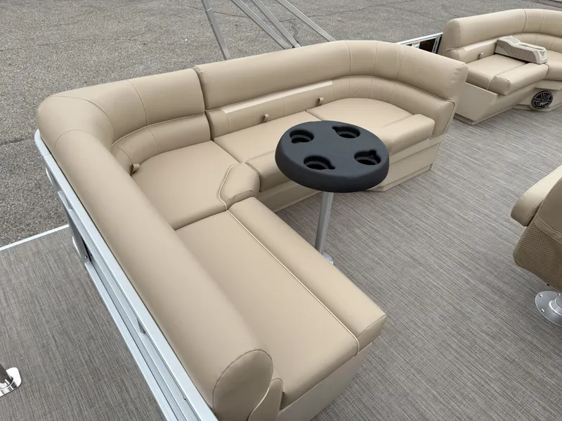 Slide: The Image of Luxurious seating on 2025 Godfrey EX2086CX pontoon boat with cupholder table. - 8