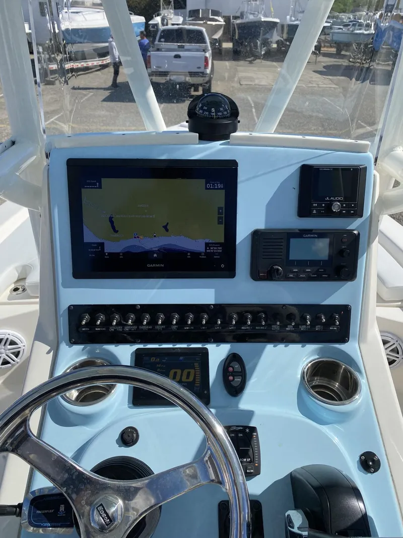 Slide: The Image of Control panel of a 2021 Pathfinder 2200 TRS boat with navigation equipment. - 4