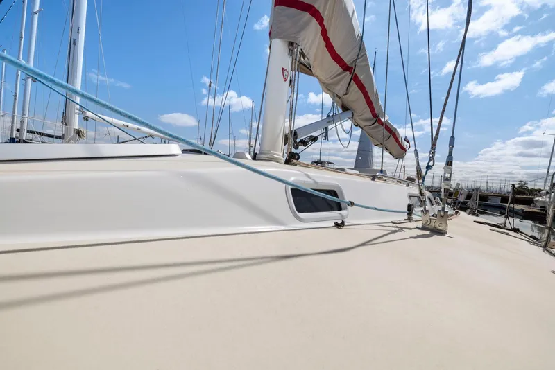 Slide: The Image of Sailboat deck view of 1994 J Boats J/130 under clear blue sky. - 6