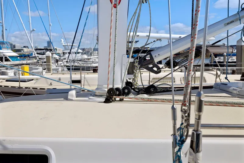 Slide: The Image of Sailboat deck of 1994 J Boats J/130 with rigging details in marina. - 7