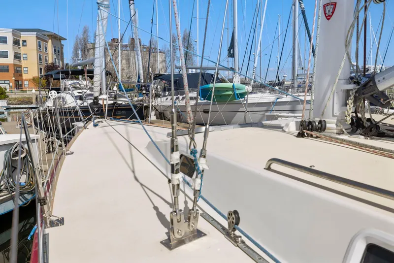 Slide: The Image of Sailboat deck view of 1994 J Boats J/130 in marina setting. - 8