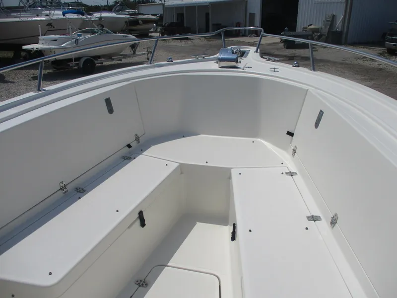 Slide: The Image of 2006 Pursuit 2670 Center Console boat interior with spacious seating and storage compartments. - 8