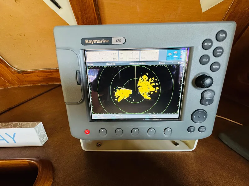 Slide: The Image of Raymarine radar display on 1984 Fu Hwa Sea Horse 34 boat, showing navigation data. - 33
