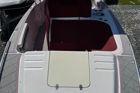 Slide: The Image of 2008 Donzi 35ZX boat interior with red seating and white deck. - 29