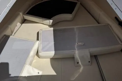 Slide: The Image of Interior seating of a 2008 Donzi 35ZX boat, featuring cushioned upholstery. - 30