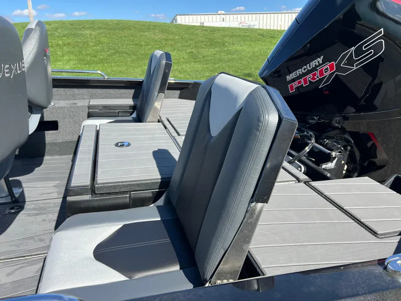 Slide: The Image of 2025 Vexus ADX190 boat interior with Mercury Pro XS engine, featuring sleek seating and modern design. - 11