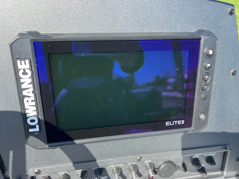 Slide: The Image of Lowrance Elite fishfinder on 2025 Vexus ADX190 boat dashboard. - 15