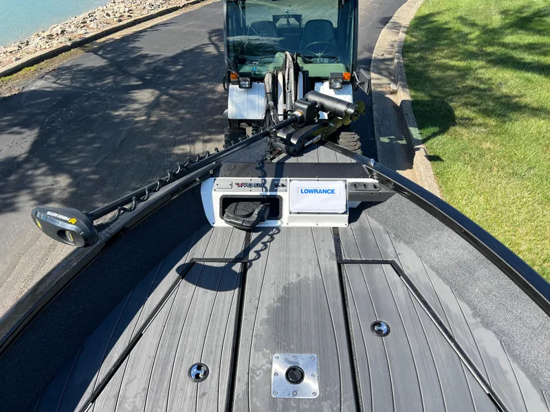 Slide: The Image of 2025 Vexus ADX190 boat with Lowrance equipment, parked near a waterfront. - 19