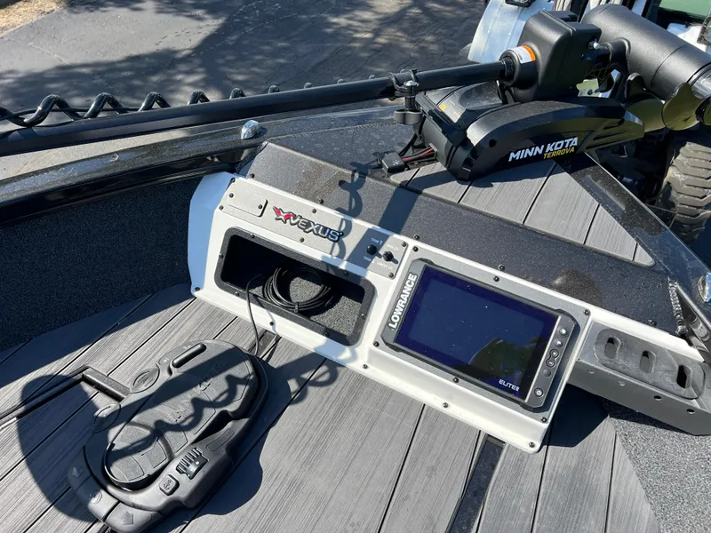 Slide: The Image of 2025 Vexus ADX190 boat dashboard with Lowrance display and Minn Kota trolling motor. - 20