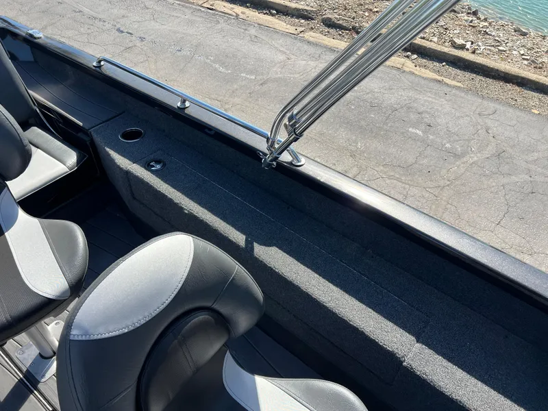 Slide: The Image of Interior of 2025 Vexus ADX190 boat with seating and storage compartments. - 27