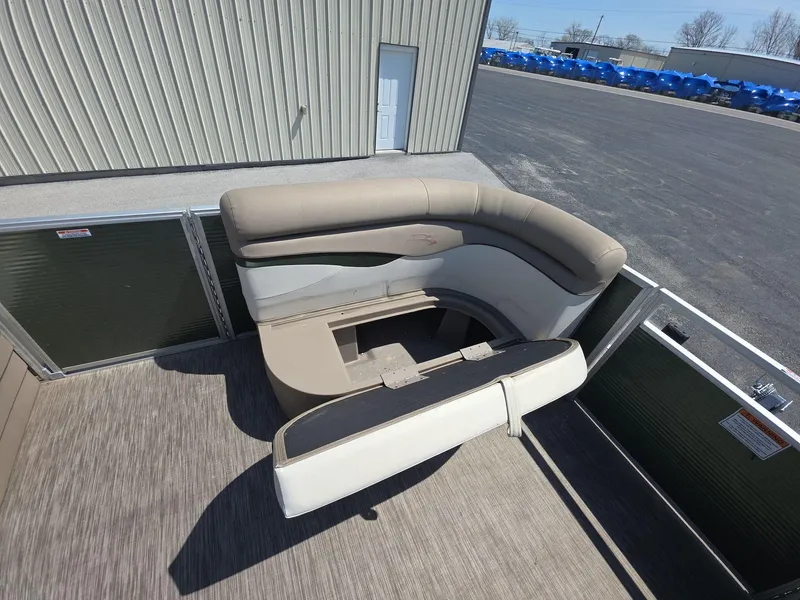 Slide: The Image of 2020 Bennington S 20 SS pontoon boat interior with beige seating and carpeted floor. - 13