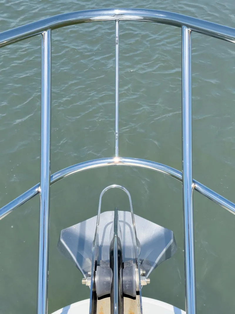 Slide: The Image of Bow view of 2020 Riviera 4800 Sport Yacht with stainless steel railings. - 25