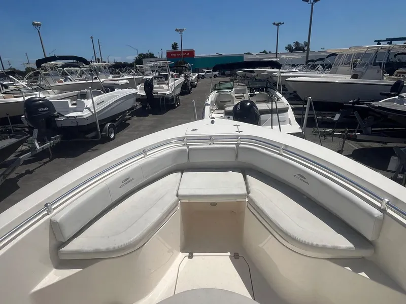 Slide: The Image of Cobia 237 Center Console 2022 at a boat dealership lot. - 7