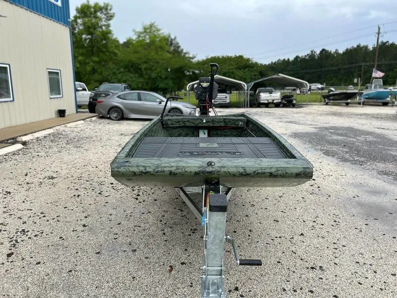 Slide: The Image of 2025 Gator Tail 1754 Extreme boat on trailer in outdoor dealership lot. - 3