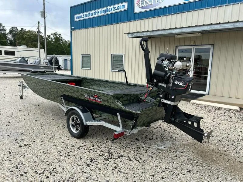 Slide: The Image of 2025 Gator Tail 1754 Extreme boat on trailer outside Southern Fishing Boats store. - 7