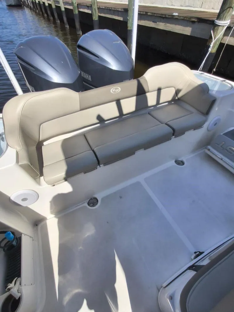 Slide: The Image of 2021 Key West 263 FS boat with Yamaha engines, featuring spacious seating and sleek design. - 9