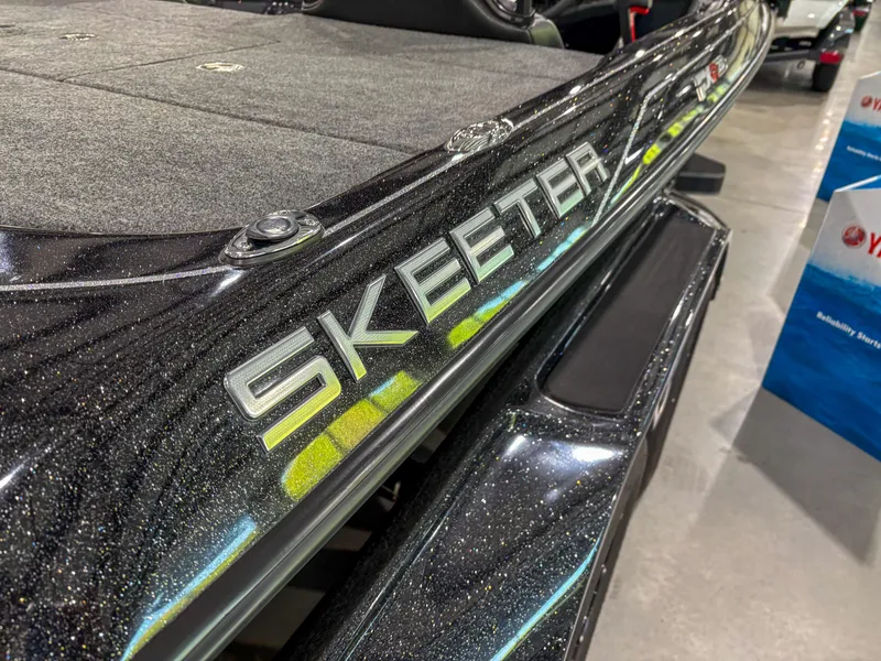 Slide: The Image of 2025 Skeeter FXR20 boat with sleek design and metallic finish. - 5