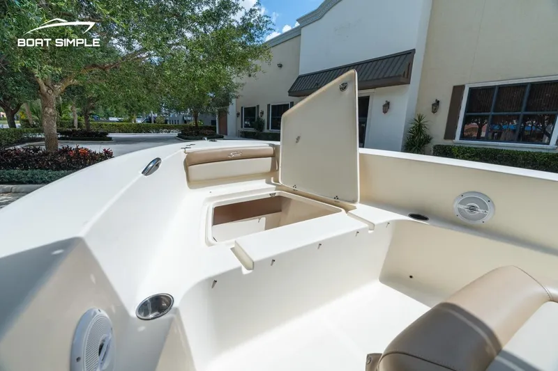 Slide: The Image of 2022 Scout 195 Sportfish boat interior with open storage compartment. - 13