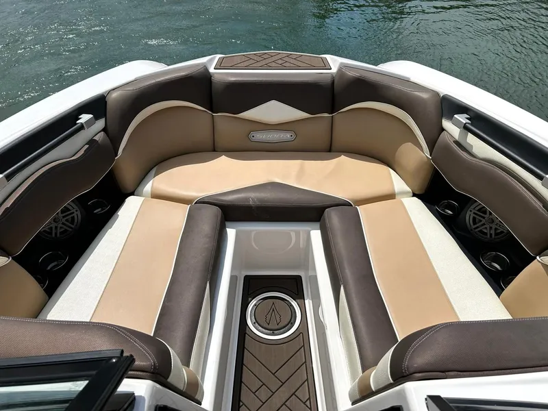 Slide: The Image of 2017 Supra SE 550 boat interior with luxurious seating and stylish design on the water. - 3
