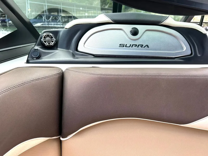 Slide: The Image of 2017 Supra SE 550 boat interior with premium seating and speaker system. - 35